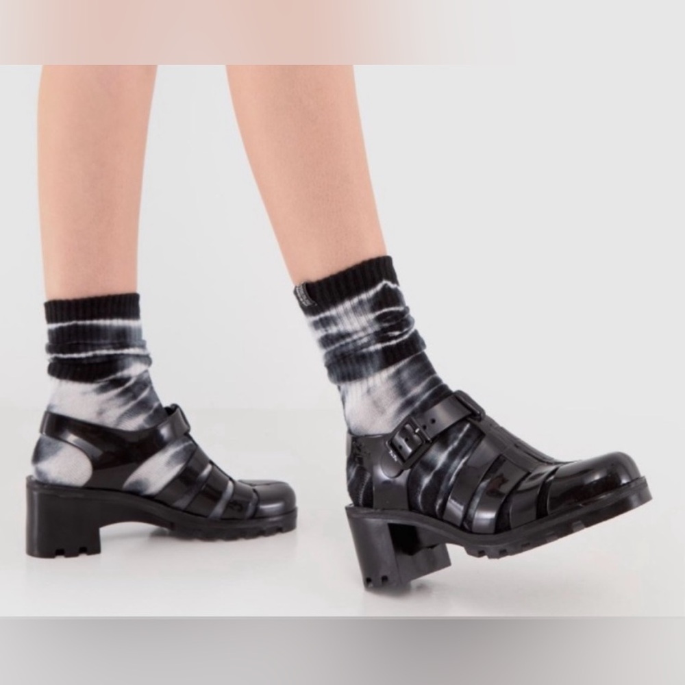 JuJu Babe black jelly sandals.